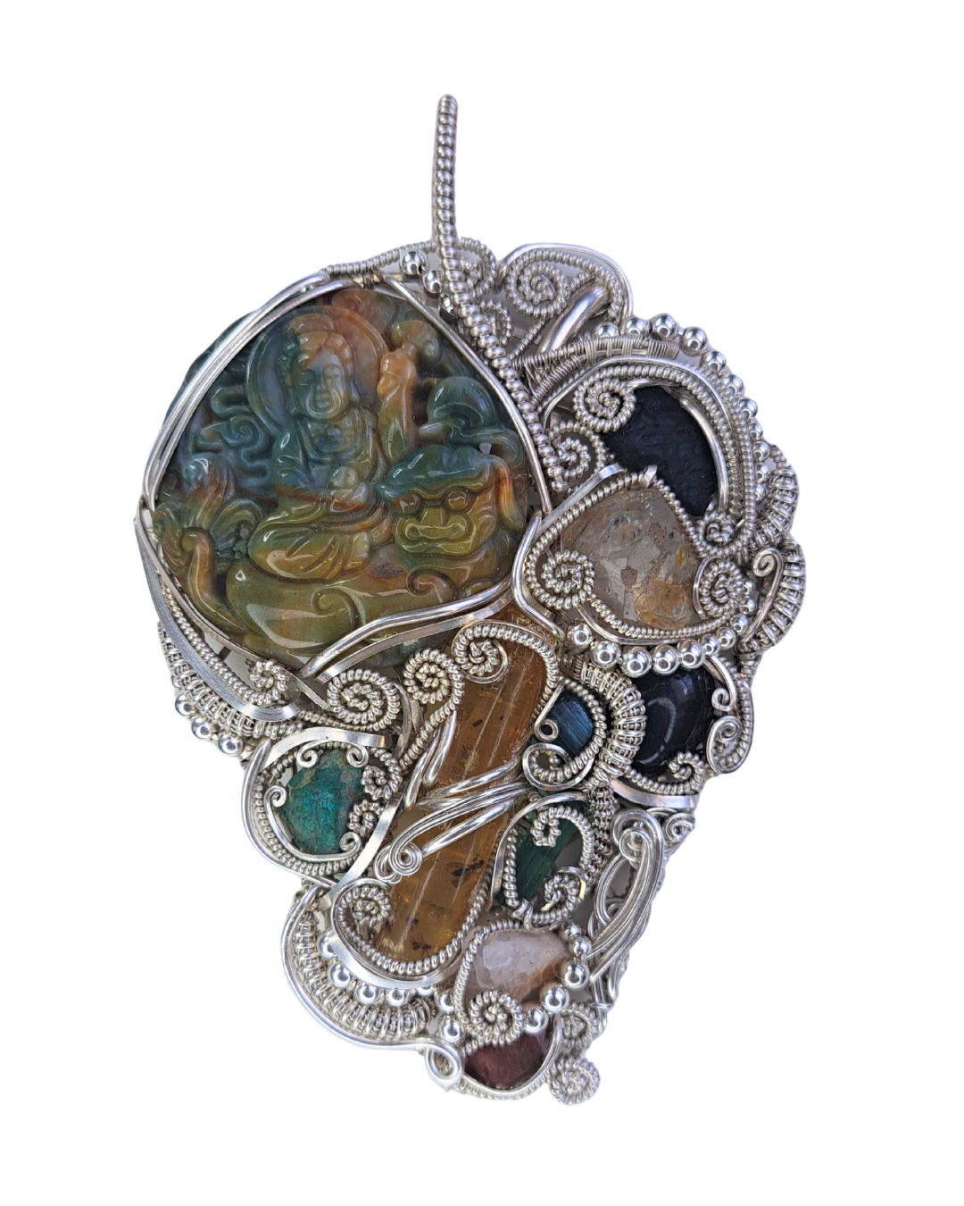 Buddha on Dragon Jasper wire-wrapped pendant with a carved jasper Buddha riding a dragon surrounded by citrine, labradorite and tourmaline in sterling silver